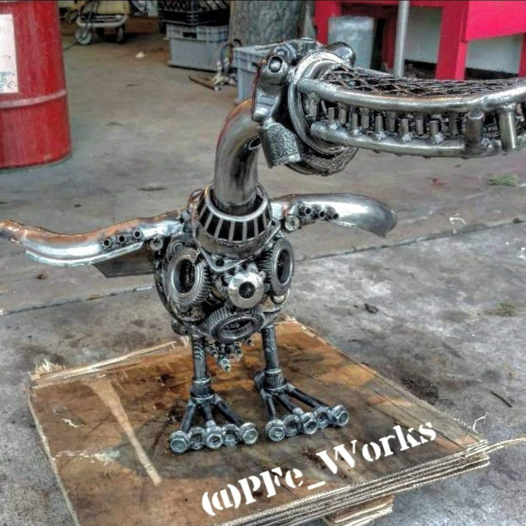 Duckasaurus metal art sculpture by scrap metal artist PJ Kennedy aka PFe works